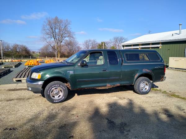 2003 F150 4WD w/ cap - cars & trucks - by owner - vehicle automotive... for sale in Wauconda, IL