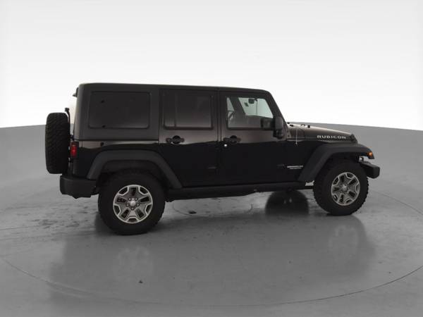 2013 Jeep Wrangler Unlimited Rubicon Sport Utility 4D suv Black for sale in Point Edward, MI – photo 12