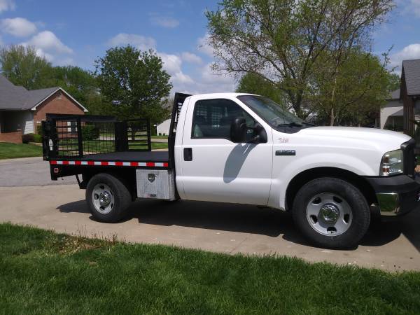 2006 FORD F350 8 STEEL FLATBED WITH TOMMY LIFT - - by for sale in Other, KS – photo 6