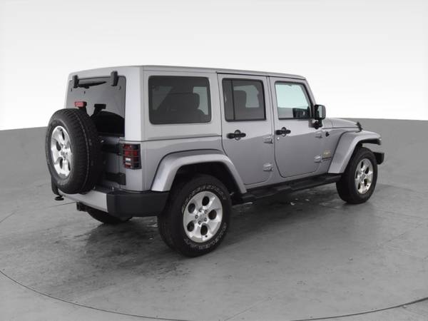 2014 Jeep Wrangler Unlimited Sahara Sport Utility 4D suv Gray - -... for sale in Lansing, MI – photo 11
