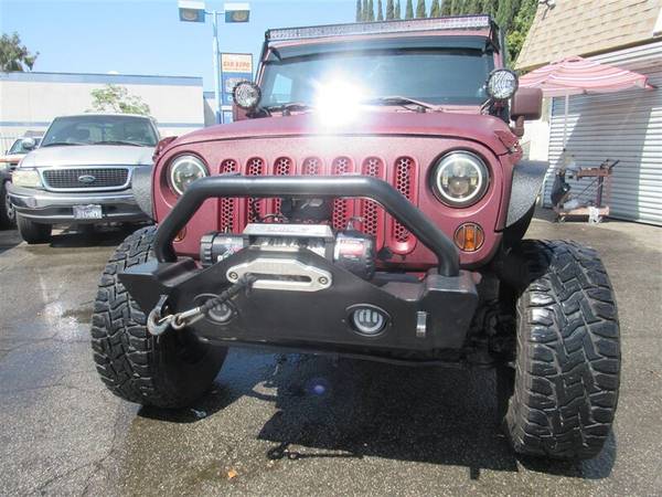 2012 Jeep Wrangler Unlimited Sport - cars & trucks - by dealer -... for sale in Downey, CA – photo 2