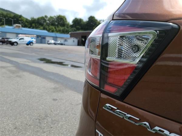 2017 Ford Escape Titanium suv Orange - cars & trucks - by dealer -... for sale in Boone, NC – photo 14