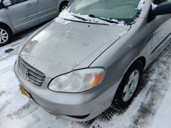 2004 Toyota Corolla runs exc new blizzak tires 40 mpg clean title -... for sale in Anchorage, AK – photo 3