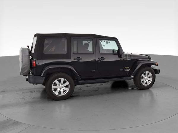 2013 Jeep Wrangler Unlimited Sahara Sport Utility 4D suv Black - -... for sale in Raleigh, NC – photo 12