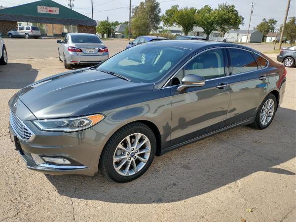 2017 Ford Fusion SE, leather, nav, 80K miles - cars & trucks - by... for sale in Coldwater, KS – photo 2