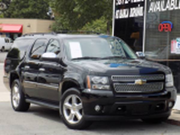 *2011* *Chevrolet* *Suburban* *LTZ 1500 4x4 4dr SUV* - cars & trucks... for sale in Raleigh, NC – photo 2