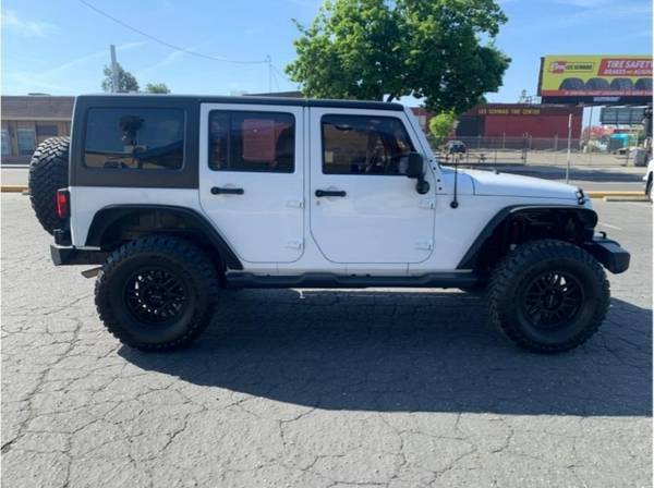 2014 Jeep Wrangler Unlimited Unlimited Sport SUV 4D for sale in Fresno, CA – photo 4