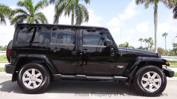 2012 *Jeep* *Wrangler Unlimited* *Sahara* Black - cars & trucks - by... for sale in West Palm Beach, FL – photo 2