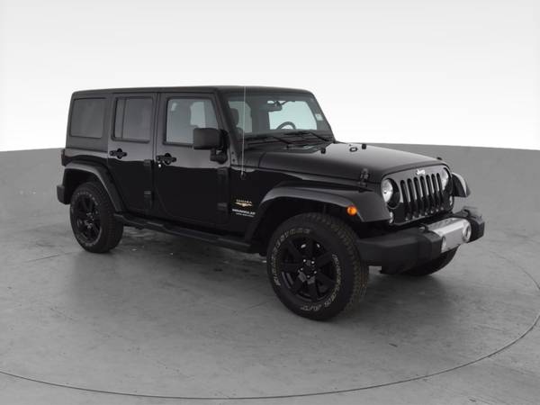 2014 Jeep Wrangler Unlimited Sahara Sport Utility 4D suv Black - -... for sale in Jacksonville, NC – photo 15