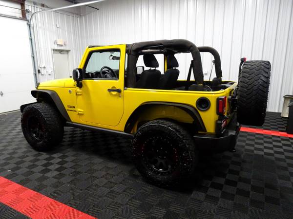 2011 Jeep Wrangler 4WD 2dr Sport hatchback Yellow - cars & trucks -... for sale in Branson West, MO – photo 2