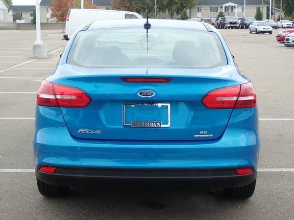 2016 Ford Focus sedan SE (Blue Candy Metallic Tinted for sale in Sterling Heights, MI – photo 7