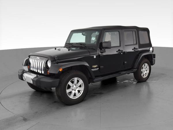2013 Jeep Wrangler Unlimited Sahara Sport Utility 4D suv Black - -... for sale in Raleigh, NC – photo 3