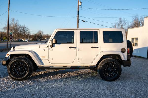 2012 Jeep Wrangler Unlimited Sahara - cars & trucks - by dealer -... for sale in Fayetteville, AR – photo 11