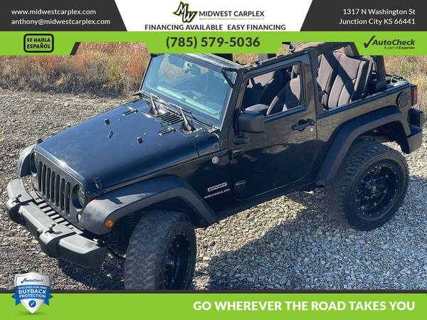 2014 Jeep Wrangler - Financing Available! - cars & trucks - by... for sale in Fort Riley, NE