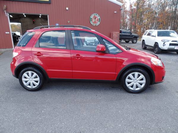 2011 *Suzuki* *SX4* *Base Trim* Vivid Red - cars & trucks - by... for sale in Johnstown , PA – photo 2