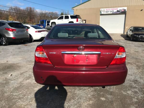 2003 Toyota Camry LE at Get n Go Auto Sales - cars & trucks - by... for sale in Martinsburg, WV – photo 4
