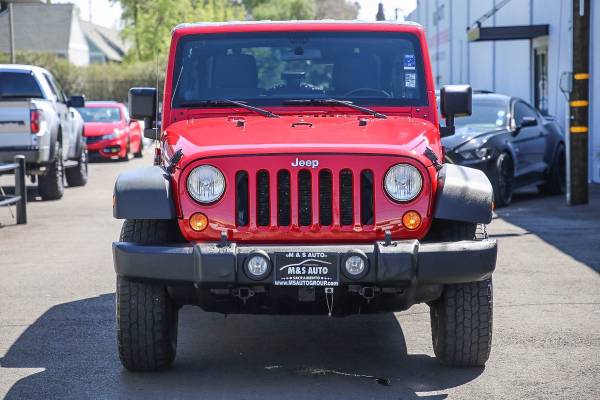 2011 Jeep Wrangler Unlimited Rubicon suv Flame Red Clear Coat - cars for sale in Sacramento, NV – photo 2