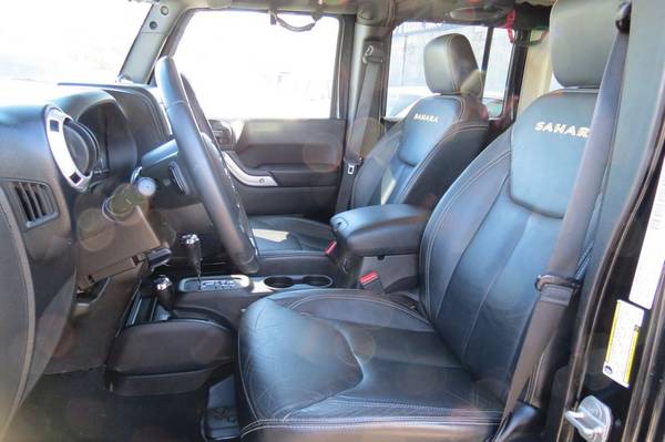 2013 Jeep Wrangler Unlimited Sahara 4x4 - cars & trucks - by dealer... for sale in Monroe, LA – photo 9