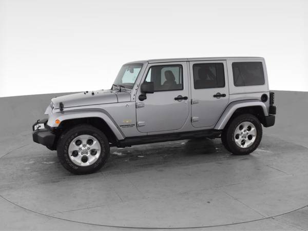 2014 Jeep Wrangler Unlimited Sahara Sport Utility 4D suv Gray - -... for sale in Lansing, MI – photo 4