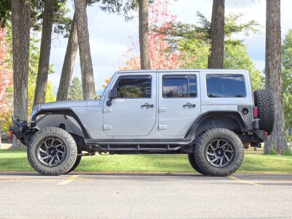 2013 JEEP WRANGLER 4x4 4WD UNLIMITED SPORT SUV 4D SUV - cars &... for sale in Kalispell, MT – photo 2