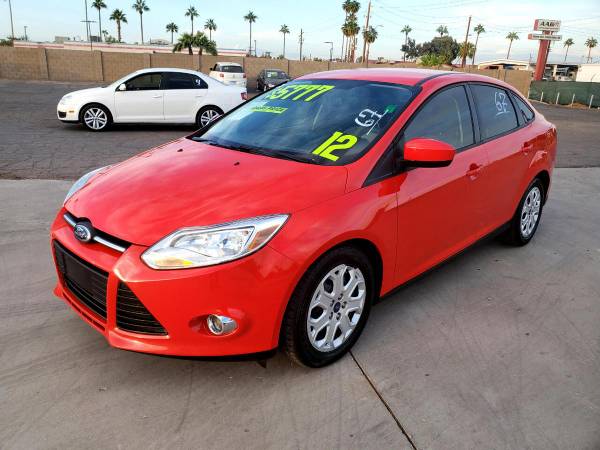 2012 Ford Focus SE Sedan FREE CARFAX ON EVERY VEHICLE - cars &... for sale in Glendale, AZ – photo 2