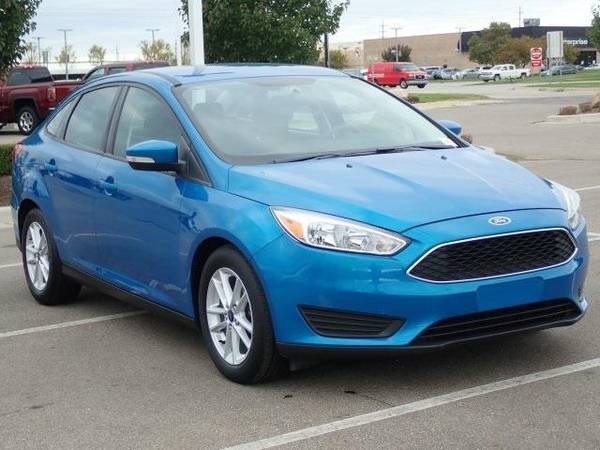 2016 Ford Focus sedan SE (Blue Candy Metallic Tinted for sale in Sterling Heights, MI – photo 2
