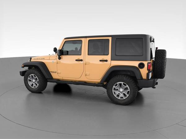 2014 Jeep Wrangler Unlimited Rubicon Sport Utility 4D suv Beige - -... for sale in Fort Collins, CO – photo 6
