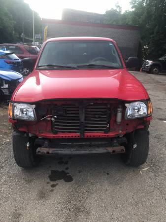12500 obo ToyotaTacoma lifted wheels trade new frame for sale in Mc Donald, PA – photo 2