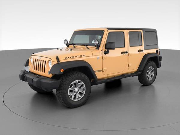 2014 Jeep Wrangler Unlimited Rubicon Sport Utility 4D suv Beige - -... for sale in Colorado Springs, CO – photo 3