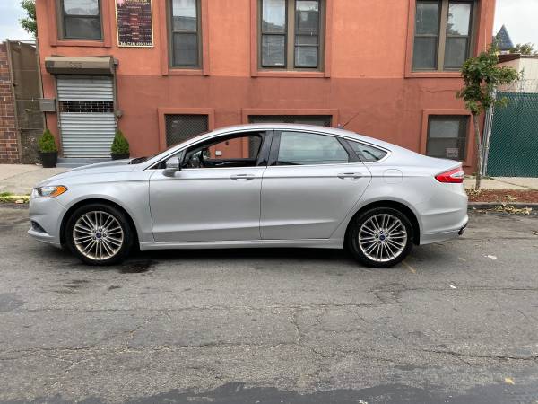 2014 Ford Fusion SE - cars & trucks - by owner - vehicle automotive... for sale in Bronx, NY – photo 2