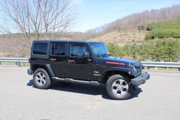 2017 Jeep Wrangler Unlimited Sahara suv Black - - by for sale in Boone, NC – photo 2