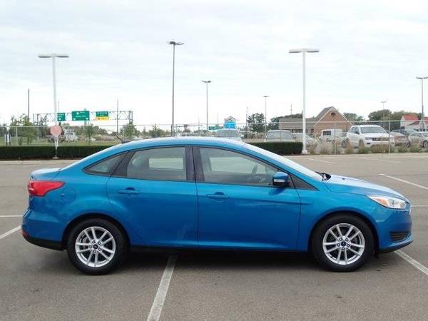 2016 Ford Focus sedan SE (Blue Candy Metallic Tinted for sale in Sterling Heights, MI – photo 9