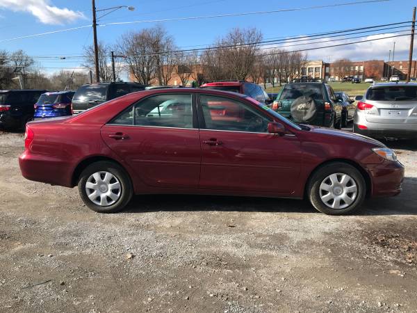 2003 Toyota Camry LE at Get n Go Auto Sales - cars & trucks - by... for sale in Martinsburg, WV – photo 2