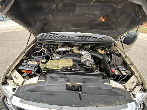 Ford F350 with topper Long Bed 7 3 L Diesel 4x4 149k garage kept for sale in Denver, NM – photo 10