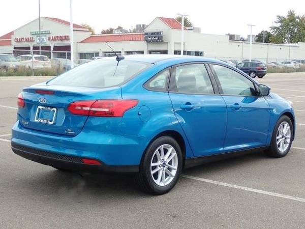 2016 Ford Focus sedan SE (Blue Candy Metallic Tinted for sale in Sterling Heights, MI – photo 8