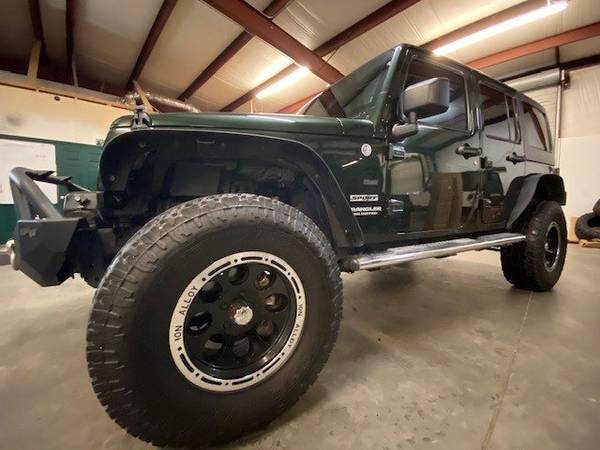 2012 Jeep Wrangler Unlimited Sport IN HOUSE FINANCE - FREE SHIPPING... for sale in DAWSONVILLE, GA – photo 18