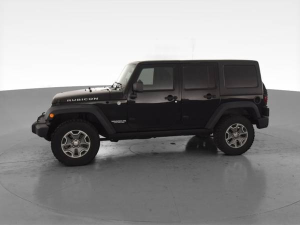2013 Jeep Wrangler Unlimited Rubicon Sport Utility 4D suv Black for sale in Point Edward, MI – photo 4
