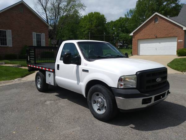 2006 FORD F350 8 STEEL FLATBED WITH TOMMY LIFT - - by for sale in Sedalia, MO – photo 12
