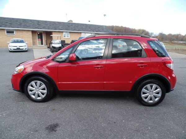 2011 *Suzuki* *SX4* *Base Trim* Vivid Red - cars & trucks - by... for sale in Johnstown , PA – photo 6