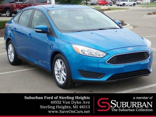 2016 Ford Focus sedan SE (Blue Candy Metallic Tinted for sale in Sterling Heights, MI