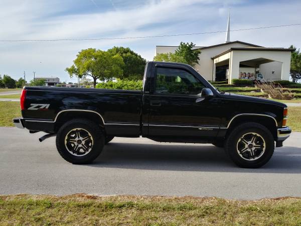 A Beautiful Black 1997 Chevrolet Silverado Z/71 4X4 Short Bed Truck for sale in Hudson, TX – photo 11