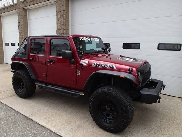 2012 Jeep Wrangler Unlimited 6 cyl, auto, 4 inch lift, SHARP RIG! for sale in Chicopee, NY – photo 11