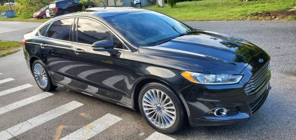 2014 Ford Fusion Titanium - cars & trucks - by owner - vehicle... for sale in Orlando, FL – photo 2