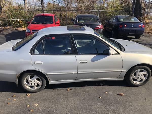 2000 Toyota Corolla ,Stick - cars & trucks - by dealer - vehicle... for sale in Niagara Falls, NY